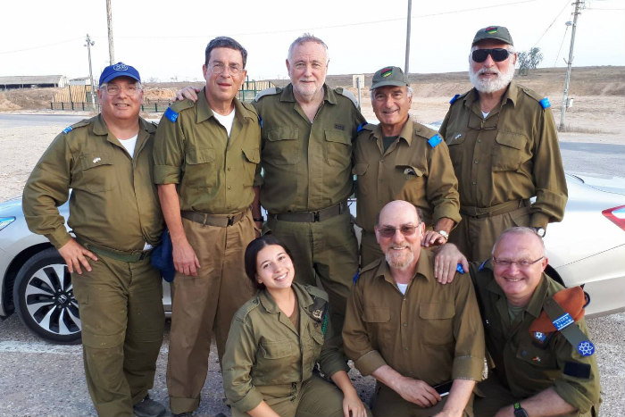 Group of Volunteers for Israel volunteers in IDF uniforms 