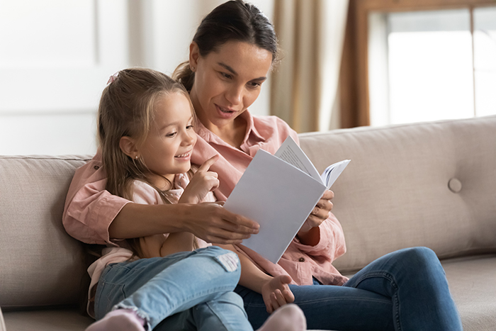 Mother reading to child