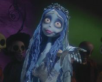 Claymation woman with blue skin and wavy blue hair in wedding dress and veil extends her hand to the viewer.