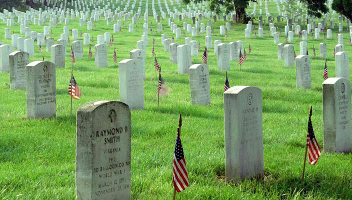 Veterans graves with American flags for U.S. Memorial Day