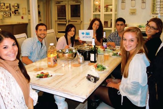 Students Sitting at Shabbat Table