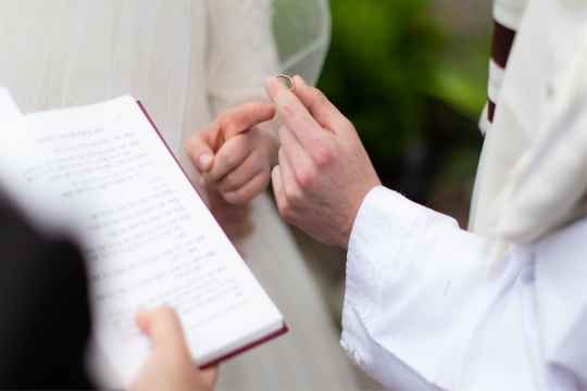 couple exchanging rings