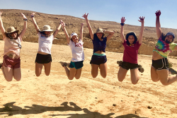 students joyously jumping in the air during a NFTY in Israel trip